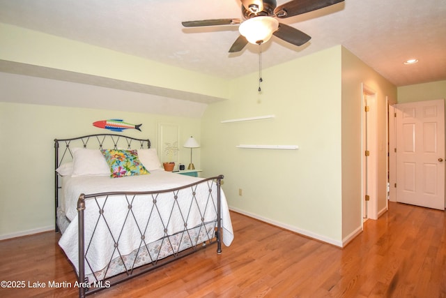 127 Ridge Crest Dr, Jacksons Gap, AL 36861 - bedroom with wood finished floors, baseboards, and recessed lighting