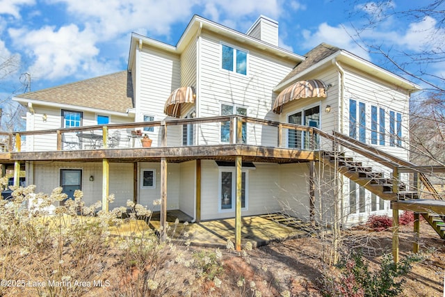 127 Ridge Crest Dr, Jacksons Gap, AL 36861 - rear view of house with a chimney, roof with shingles, stairway, a wooden deck, and a patio area
