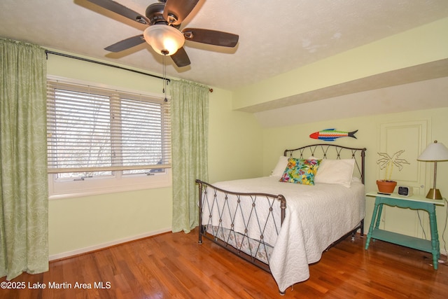 127 Ridge Crest Dr, Jacksons Gap, AL 36861 - bedroom featuring wood finished floors, baseboards, and ceiling fan