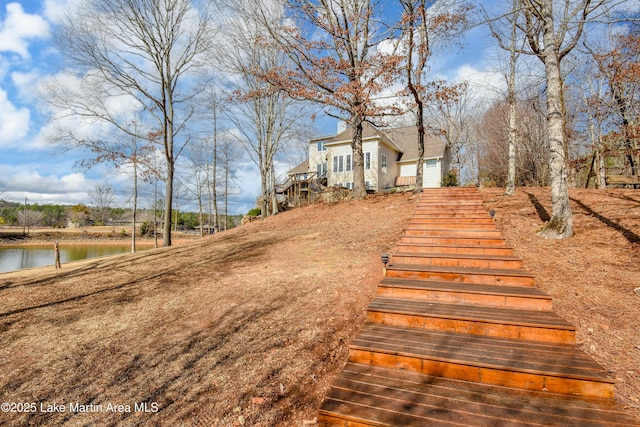 127 Ridge Crest Dr, Jacksons Gap, AL 36861 - view of yard featuring stairway and a water view