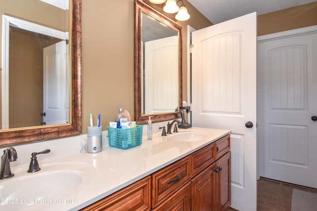 bathroom featuring vanity and tile patterned floors