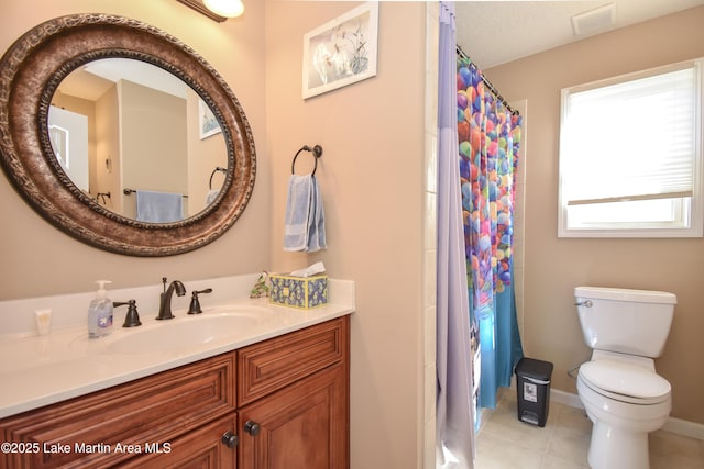 bathroom with a shower with curtain, tile patterned floors, toilet, and vanity