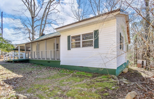 view of home's exterior with covered porch