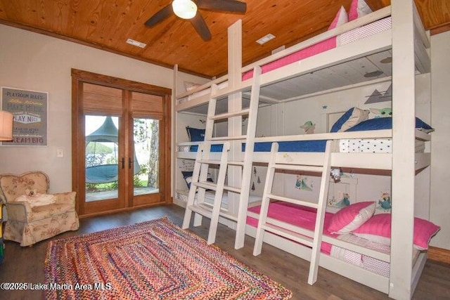 bedroom with wood ceiling, access to exterior, dark hardwood / wood-style flooring, and french doors