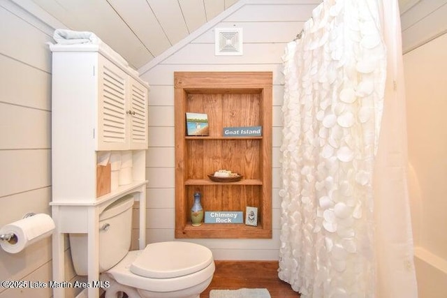 bathroom featuring vaulted ceiling, wood ceiling, and toilet