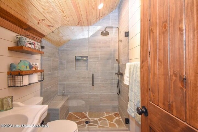 bathroom with toilet, a shower with shower door, vaulted ceiling, wooden ceiling, and vanity