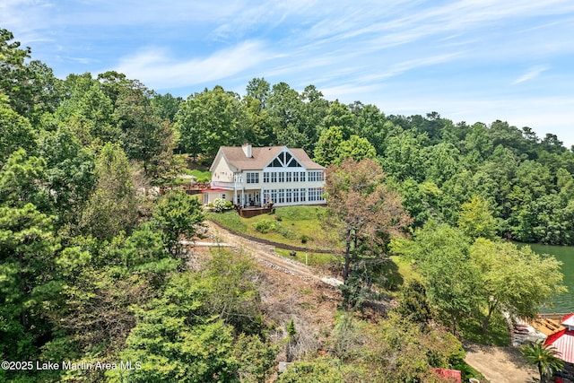 876 Ridge Rd, Dadeville, AL 36853 - aerial view of property and surrounding area featuring a heavily wooded area