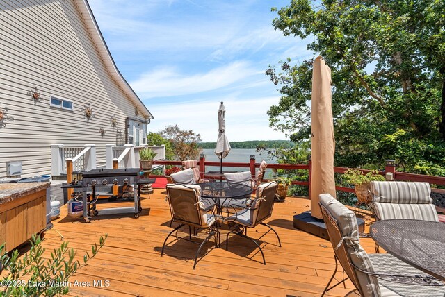 876 Ridge Rd, Dadeville, AL 36853 - wooden terrace with outdoor dining area