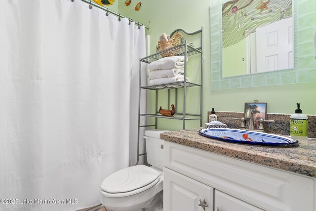 876 Ridge Rd, Dadeville, AL 36853 - bathroom with vanity and a shower with curtain