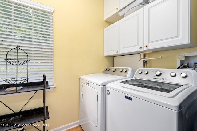 876 Ridge Rd, Dadeville, AL 36853 - laundry area with washer and dryer and cabinet space