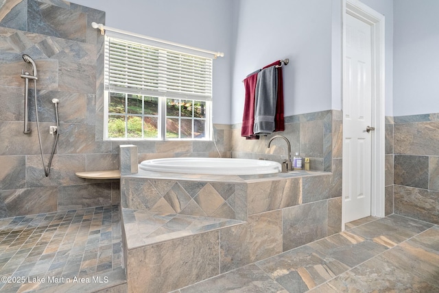 876 Ridge Rd, Dadeville, AL 36853 - bathroom featuring a bath and a tile shower