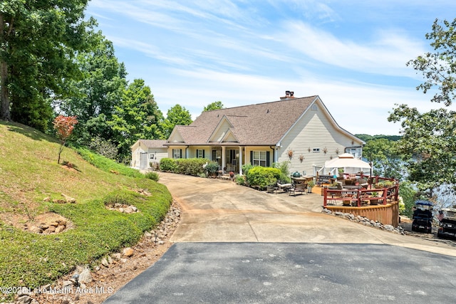 876 Ridge Rd, Dadeville, AL 36853 - view of front of property featuring a gazebo, a chimney, driveway, and a shingled roof