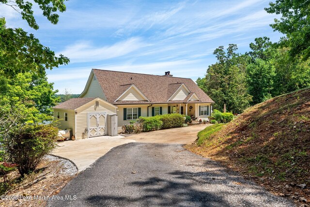 876 Ridge Rd, Dadeville, AL 36853 - view of front of home with driveway and a shingled roof