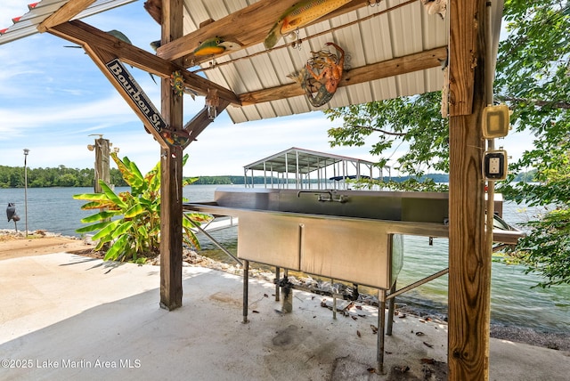 876 Ridge Rd, Dadeville, AL 36853 - view of patio with a water view