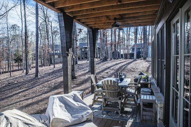 wooden deck with ceiling fan