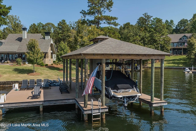 dock area with a water view