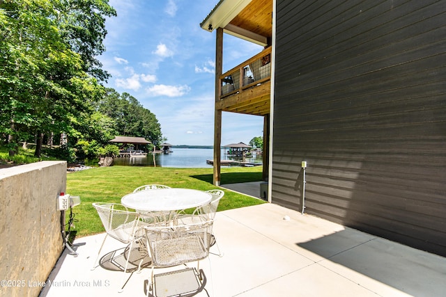 view of patio / terrace featuring a water view