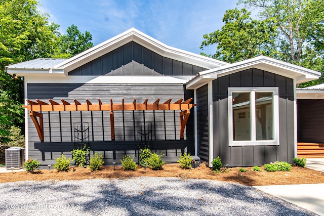 view of front of home with cooling unit