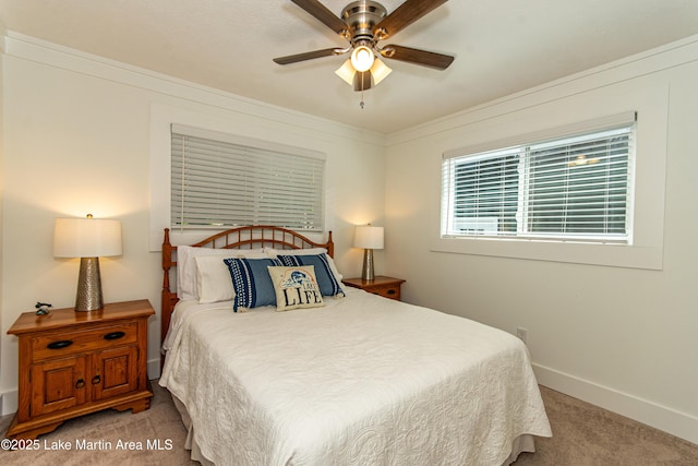 bedroom featuring ceiling fan and carpet