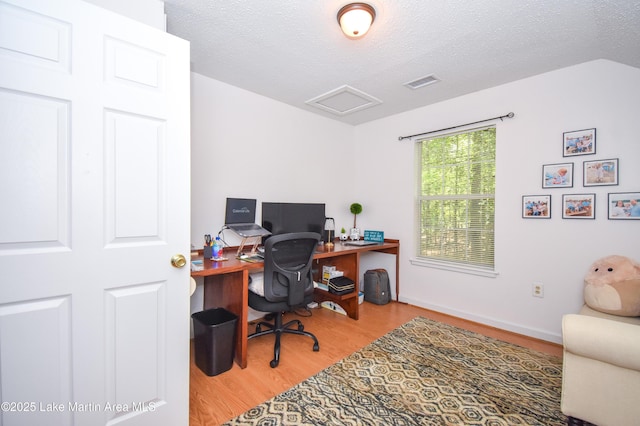 93 Restful Cv, Dadeville, AL 36853 - office area with wood finished floors, a textured ceiling, and attic access