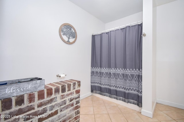 93 Restful Cv, Dadeville, AL 36853 - bathroom featuring tile patterned flooring and curtained shower