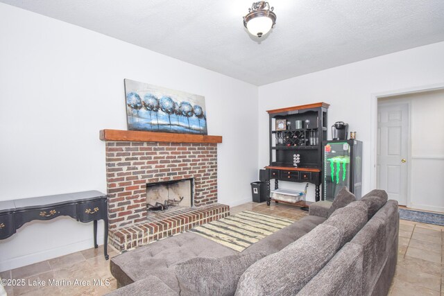 93 Restful Cv, Dadeville, AL 36853 - living room featuring a brick fireplace and a textured ceiling