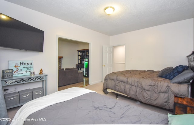 93 Restful Cv, Dadeville, AL 36853 - carpeted bedroom with a textured ceiling