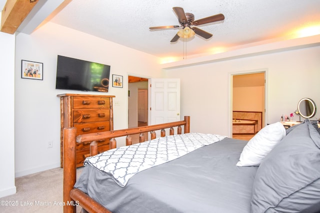 93 Restful Cv, Dadeville, AL 36853 - bedroom featuring light carpet, ensuite bathroom, and a ceiling fan