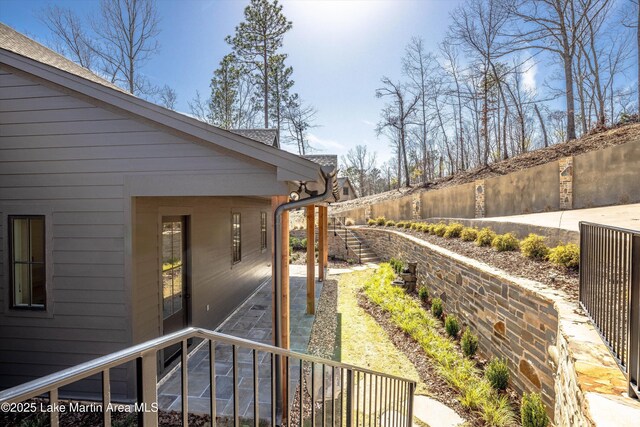 view of home's exterior featuring fence