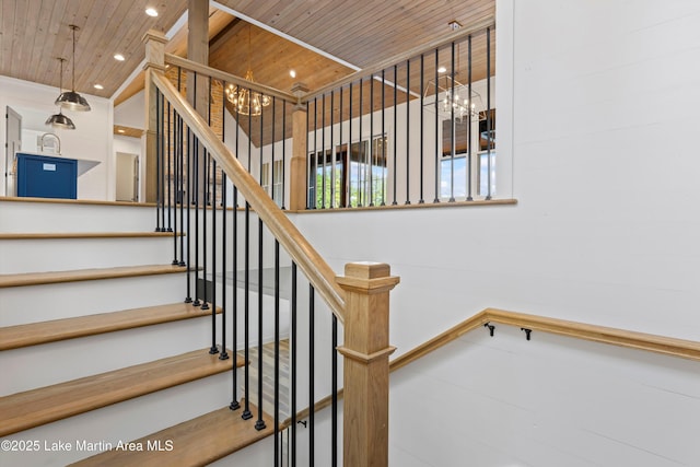 staircase featuring recessed lighting, wood ceiling, and a chandelier