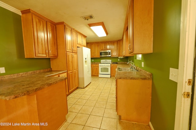 kitchen featuring light tile patterned floors, white appliances, ornamental molding, and sink