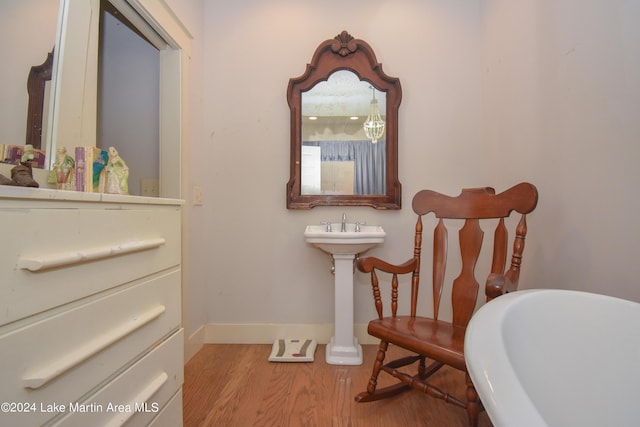 sitting room with light hardwood / wood-style flooring