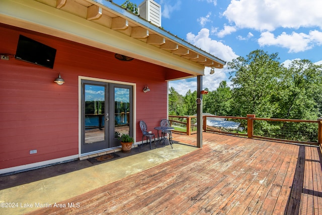 wooden terrace featuring french doors