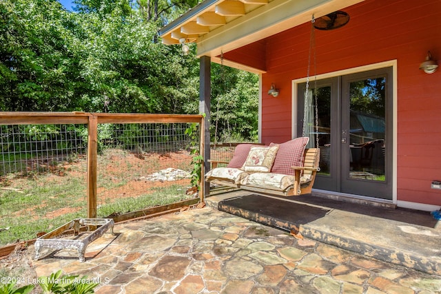 view of patio featuring french doors