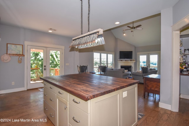 kitchen featuring wooden counters, french doors, and plenty of natural light