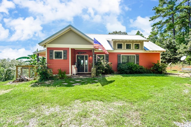 view of front of property with a front lawn