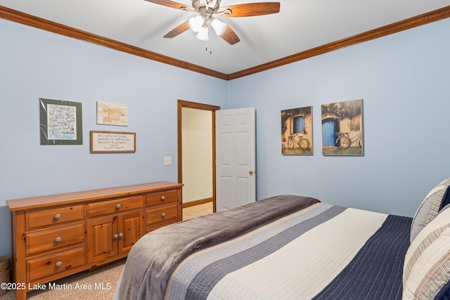 bedroom with ornamental molding, a ceiling fan, and light colored carpet