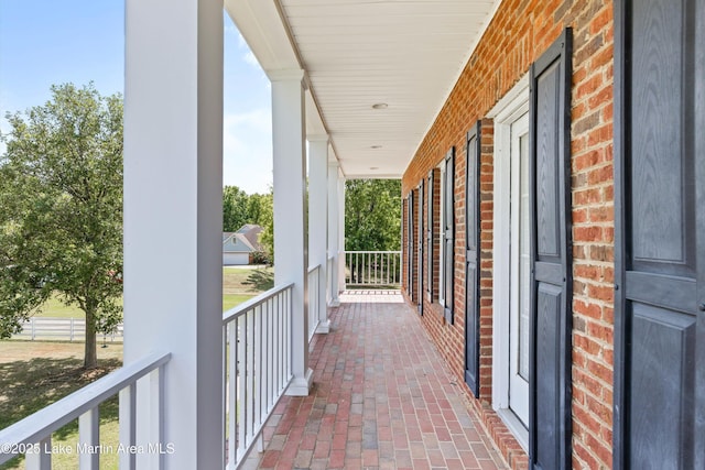 balcony featuring a porch