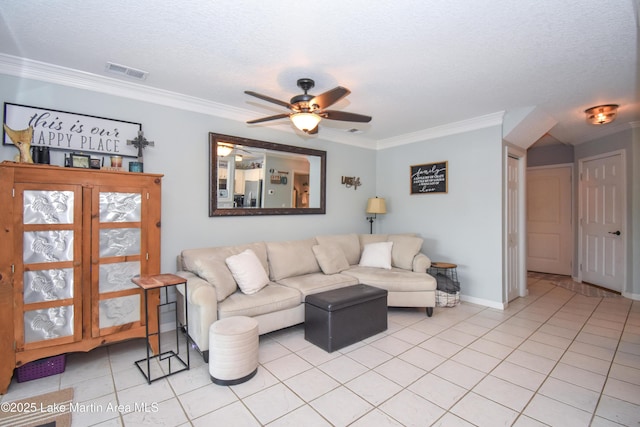 128 River Ridge Rd Unit B3, Alexander City, AL 35010 - living area with ornamental molding, light tile patterned flooring, ceiling fan, a textured ceiling, and baseboards