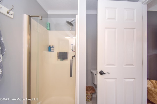 128 River Ridge Rd Unit B3, Alexander City, AL 35010 - bathroom with ornamental molding, a shower stall, and toilet