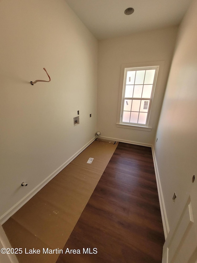 198 Mccain Rd, Eclectic, AL 36024 - washroom featuring washer hookup and wood finished floors
