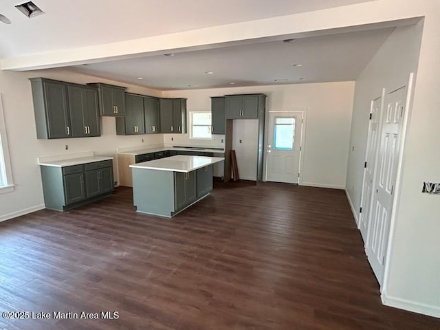 198 Mccain Rd, Eclectic, AL 36024 - kitchen featuring a center island, dark wood-type flooring, recessed lighting, and gray cabinets