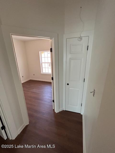 198 Mccain Rd, Eclectic, AL 36024 - corridor with dark wood-style floors and baseboards