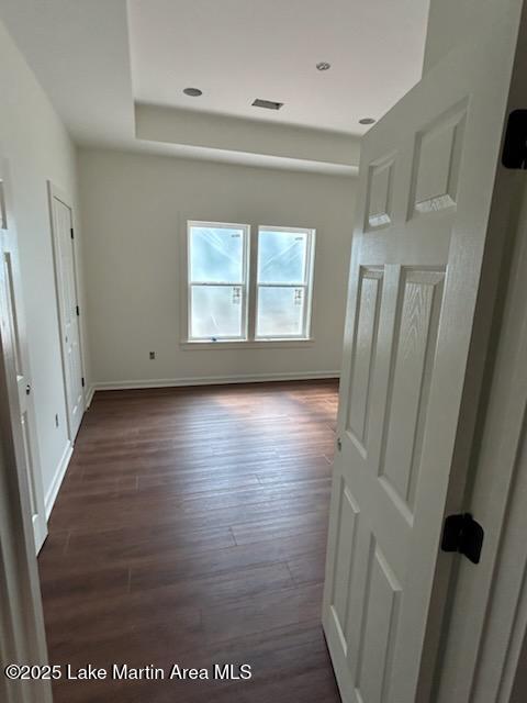 198 Mccain Rd, Eclectic, AL 36024 - unfurnished bedroom with dark wood-type flooring and recessed lighting