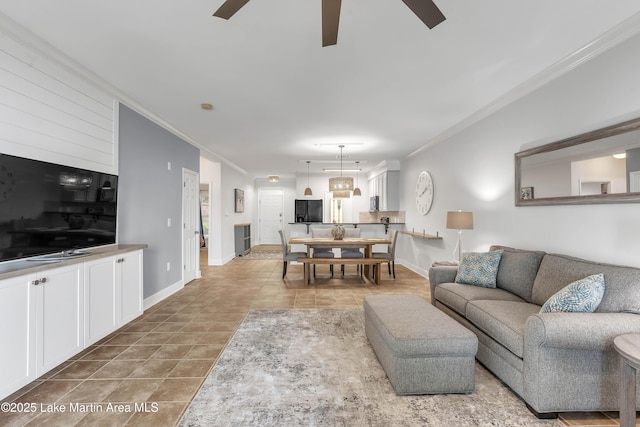 230 Crowne Pointe Rd Unit 104, Dadeville, AL 36853 - living room with ornamental molding, ceiling fan, and baseboards
