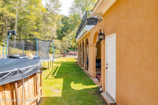 view of yard featuring a trampoline