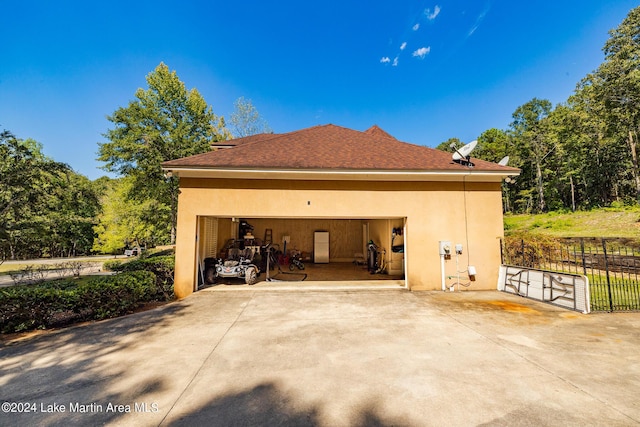 view of side of home with an outbuilding