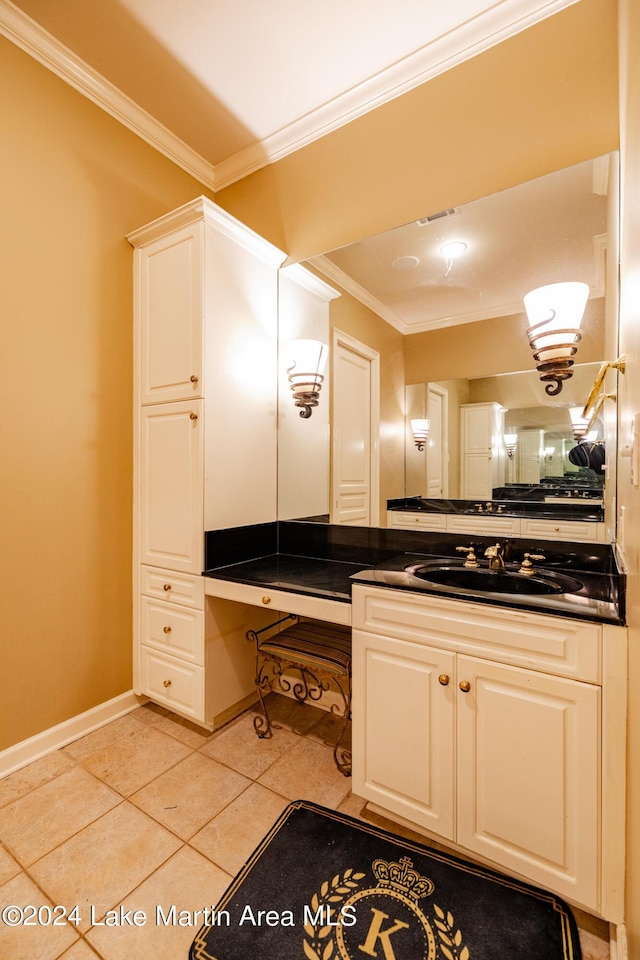 bathroom featuring tile patterned floors, vanity, and ornamental molding