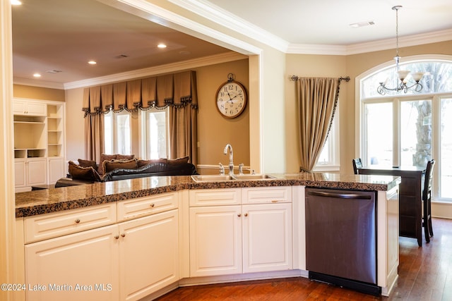 kitchen featuring an inviting chandelier, sink, stainless steel dishwasher, dark hardwood / wood-style flooring, and white cabinetry