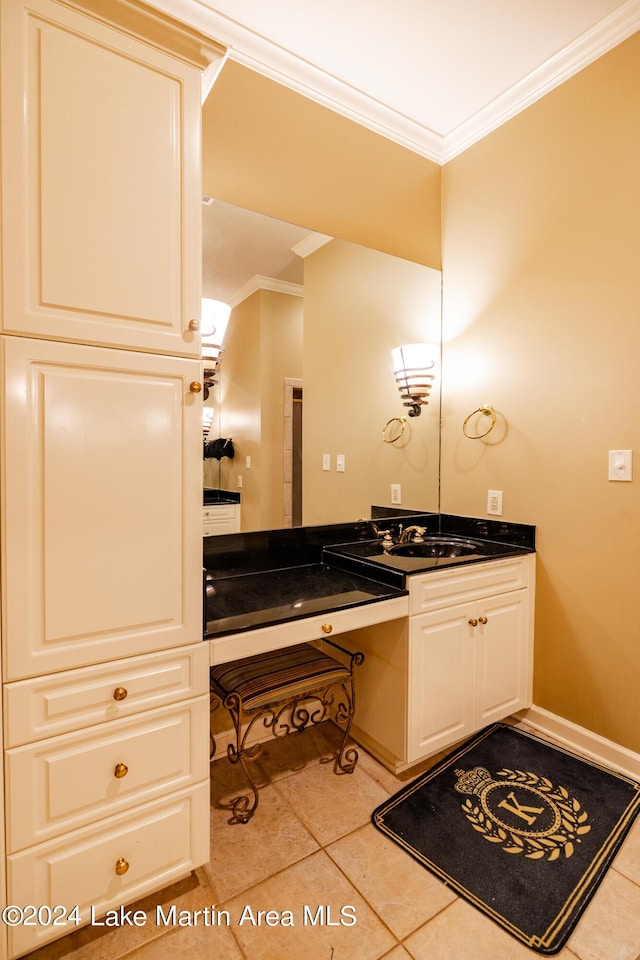 bathroom with tile patterned flooring, vanity, and ornamental molding